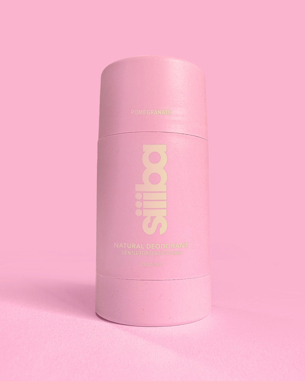 Pink deodorant container with 'Siiiba' branding on a pink background