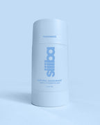 Siiiba natural deodorant bottle on a light blue background